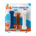 Nylabone Puppy Chew Starter Kit with chicken flavor for puppies up to 11 kg, dog chew toy and teething aid.