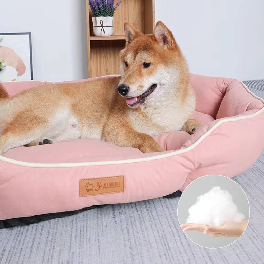Large Plush Pet Sofa Bed by Pawciara in orange and gray, cozy sleeping area for dogs and cats, perfect for winter warmth.