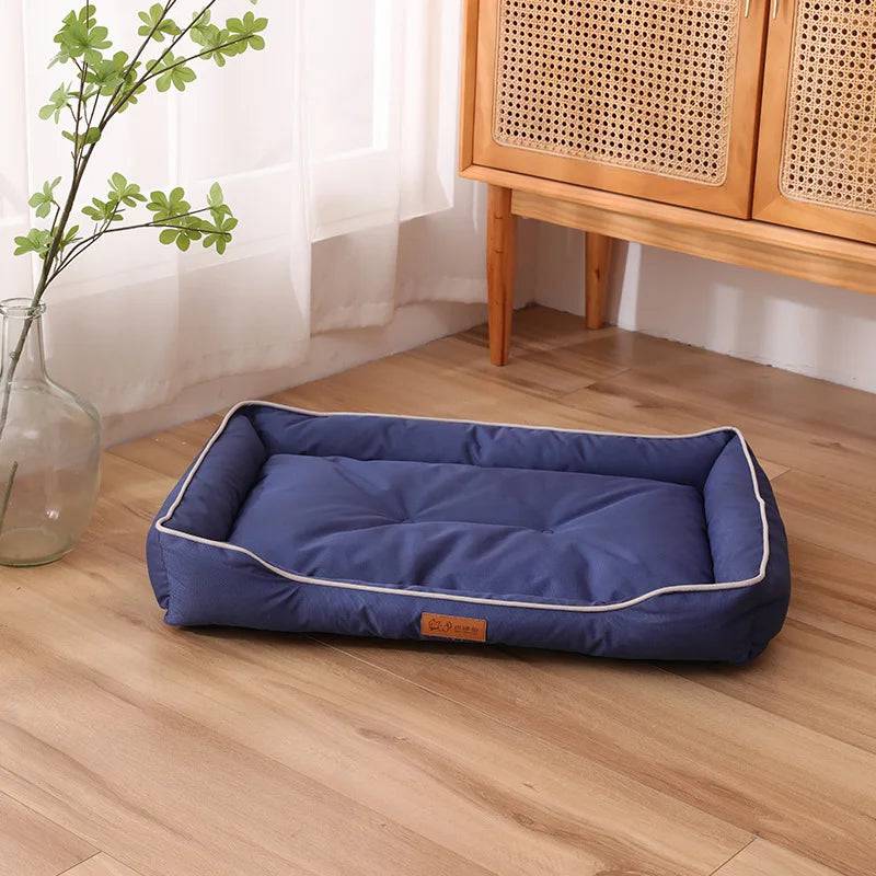Large plush Pet Sofa Bed by Pawciara in orange and gray, cozy sleeping area for dogs and cats, winter warm and comfortable.