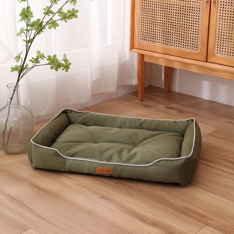 Large plush pet sofa bed by Pawciara in orange and gray, cozy and warm for dogs and cats, spacious sleeping mat for winter comfort.