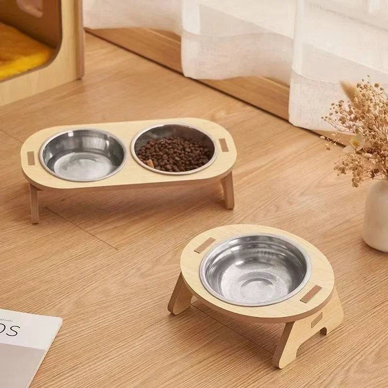 Pawciara double pet food and water bowl stand with anti-tip design for cats and dogs, featuring sturdy, non-slip stability.