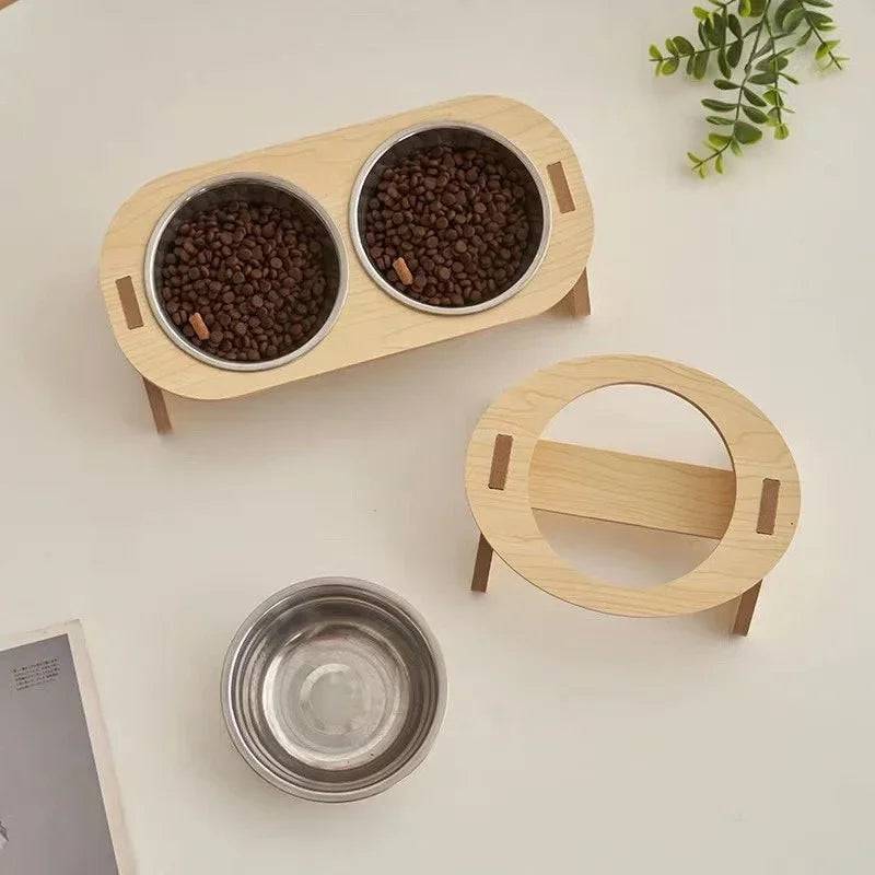 Pawciara double pet food and water bowl stand with anti-tip design for cats and dogs, featuring dual stainless steel bowls on a sturdy stand