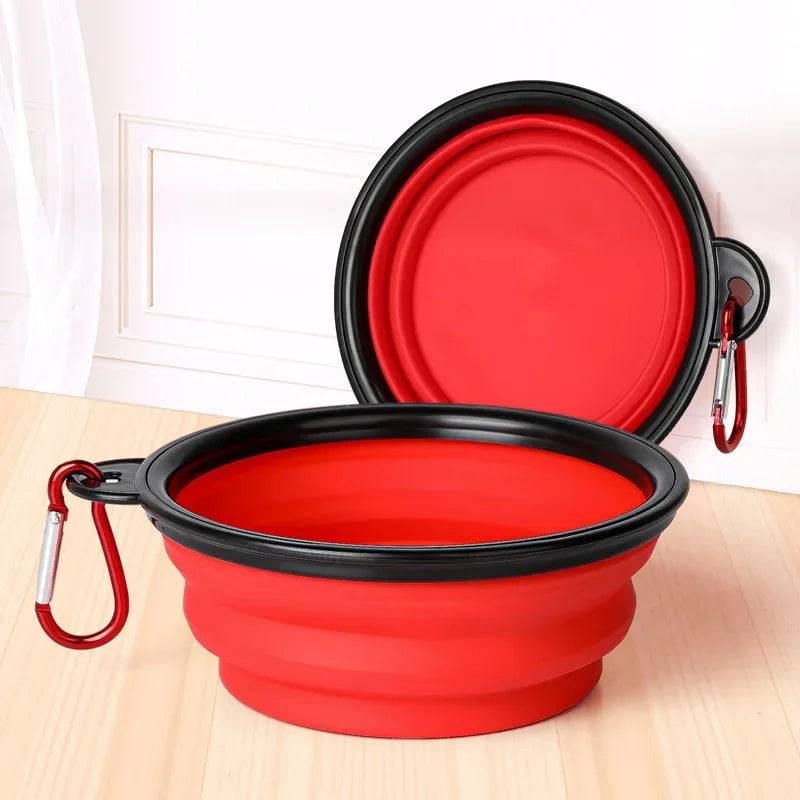 Pawciara collapsible silicone pet bowl for food and water, portable and foldable for outdoor camping and travel with a carabiner.