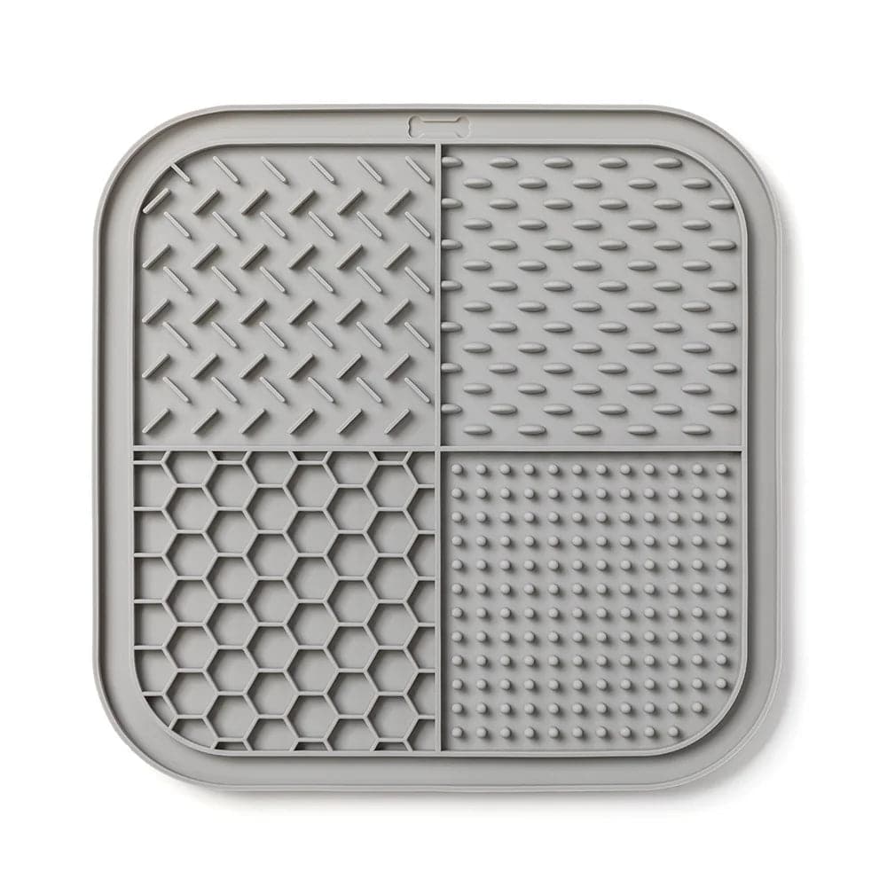 Yellow Pawciara lick mat for dogs and cats, anti-slip feeding and enrichment tray for anxiety relief and distraction during grooming.