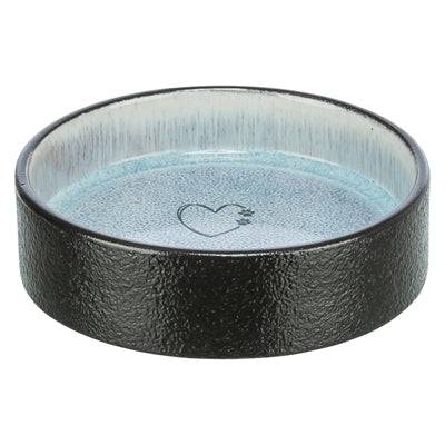 Trixie ceramic food and water bowl in assorted colors, measuring 12x12x3.5 cm, for pet feeding and hydration.