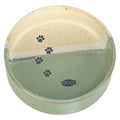 Trixie ceramic food and water bowl with paw print design in green and beige, measuring 12x12x3.5 cm.