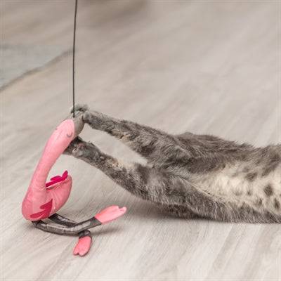 Trixie telescopic cat teaser wand with flamingo pink feather attachment, extendable up to 106 cm for engaging play.