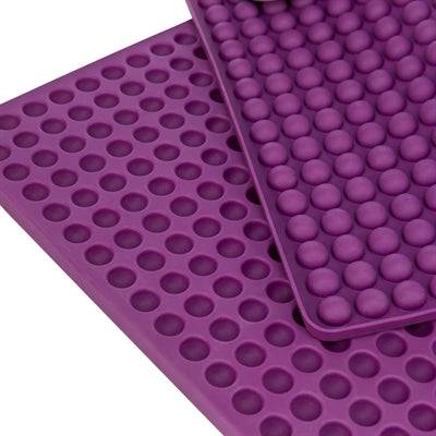 Trixie silicone baking mat for pet treats in purple, 38x28 cm, non-stick, BPA-free, ideal for homemade pet snacks.