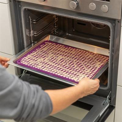 Trixie silicone baking mat for pet treats in purple, 38 x 28 cm, non-stick surface for baking and treats.